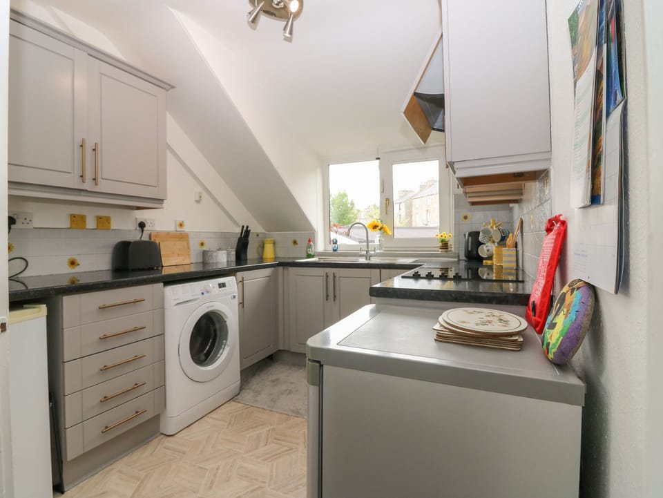 Fridge, electric kettle, toaster, cookware/dishes/utensils