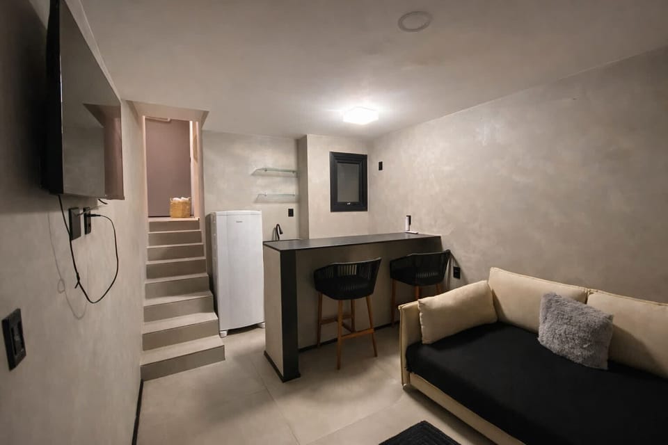 Deluxe Room | Living area | 43-inch LED TV with digital channels