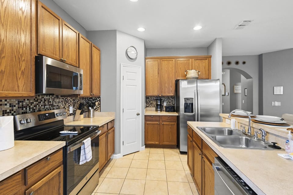 Sleek and fully-equipped, our kitchen is a culinary haven for creating and sharing meals.