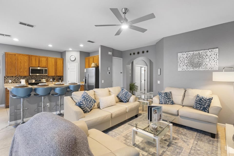 Embrace tranquility in our open-concept living room, where comfort meets contemporary elegance.