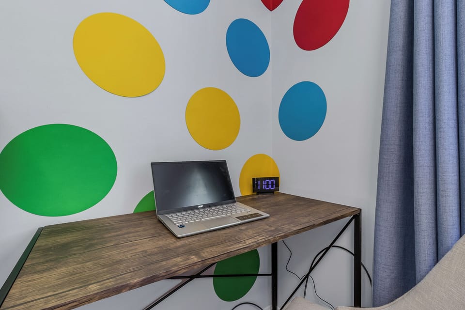 Work is easy from the Twister Room- you can even use the TV as a monitor.