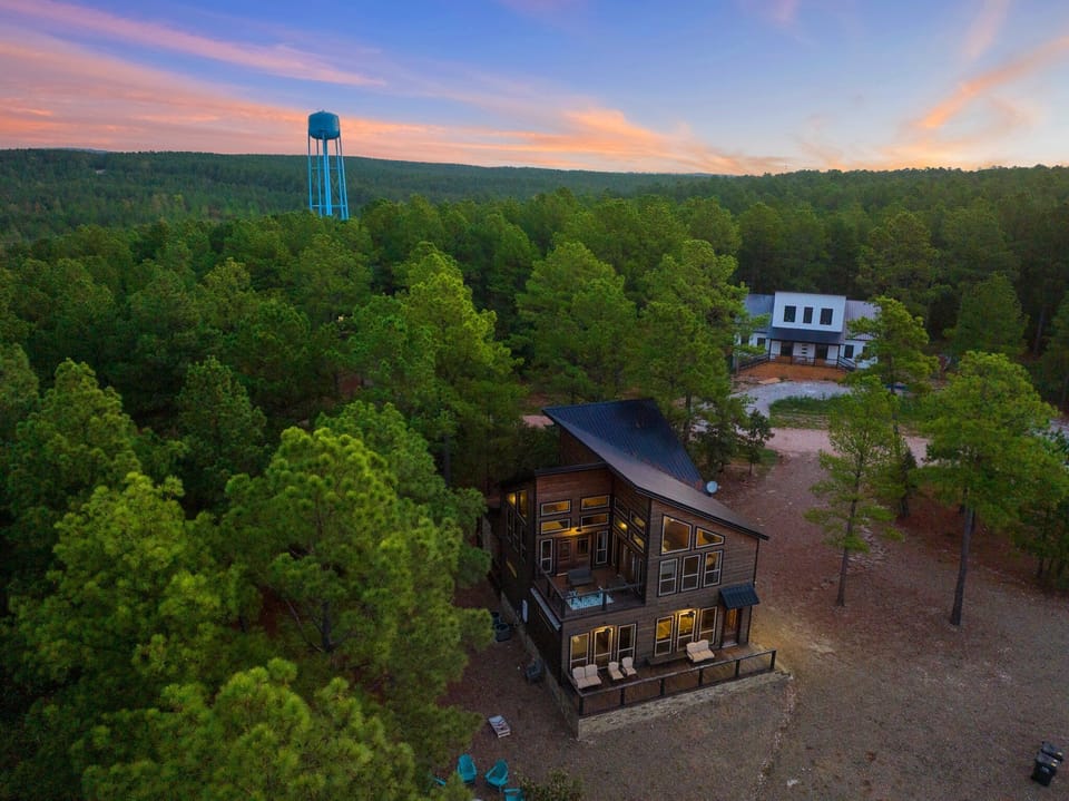 Cabin is located on over an acre lot on the corner of a cul-de-sac.