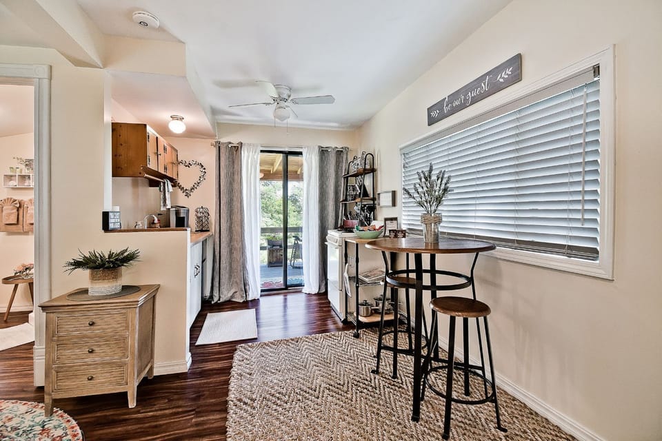 Kitchen leading to back covered deck
