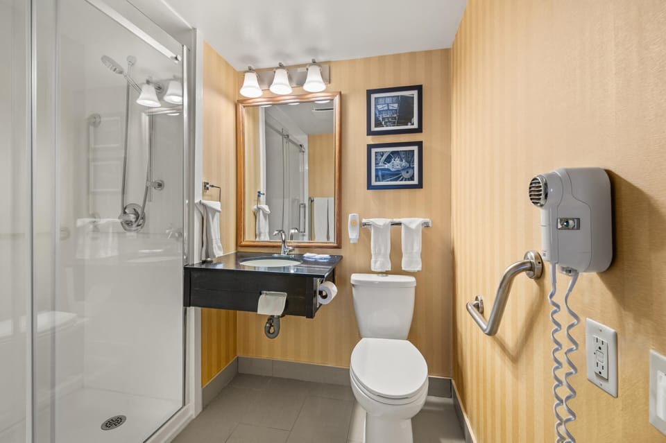 Premium bedding, desk, blackout drapes, soundproofing