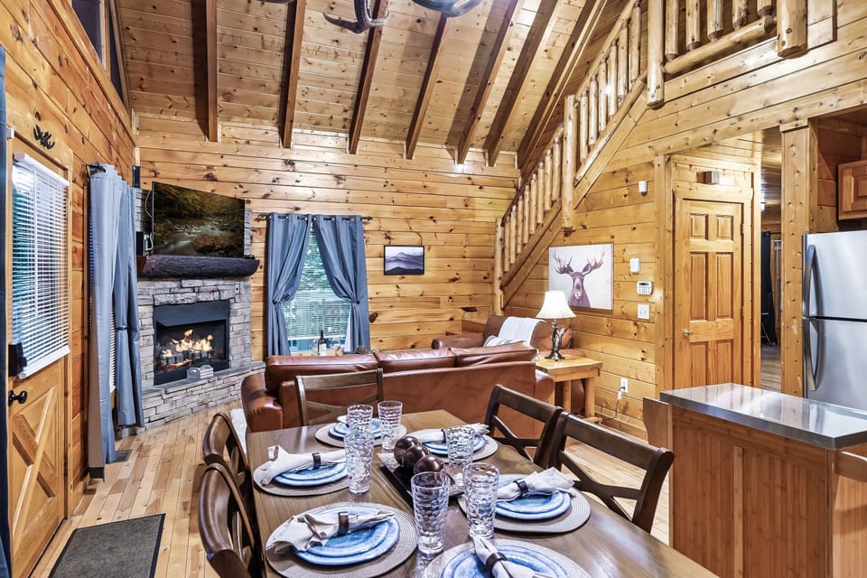 Enjoy the open concept living space and kitchen with high vaulted ceiling.