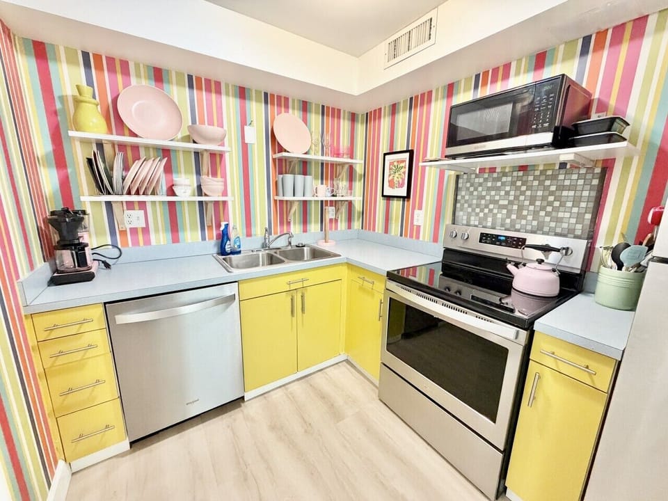 Colorful kitchen stocked for your stay
