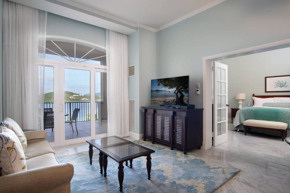 Living Room and door to the furnished patio/balcony.
