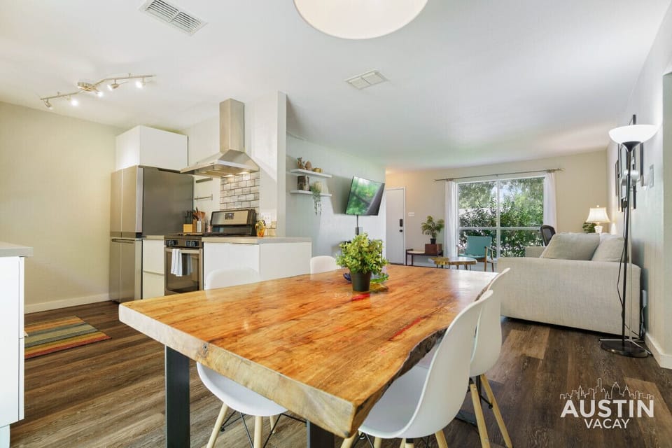 Dining area with a view of the living room and kitchen