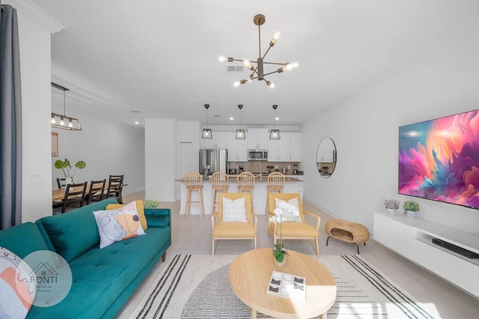 Living Room with 75` Smart TV#Disney #Parks #kingdom #springs #StoreyLake #Apartment #Vacation #Rental #waterpark #Kissimmee #Orlando #universal #citywalk