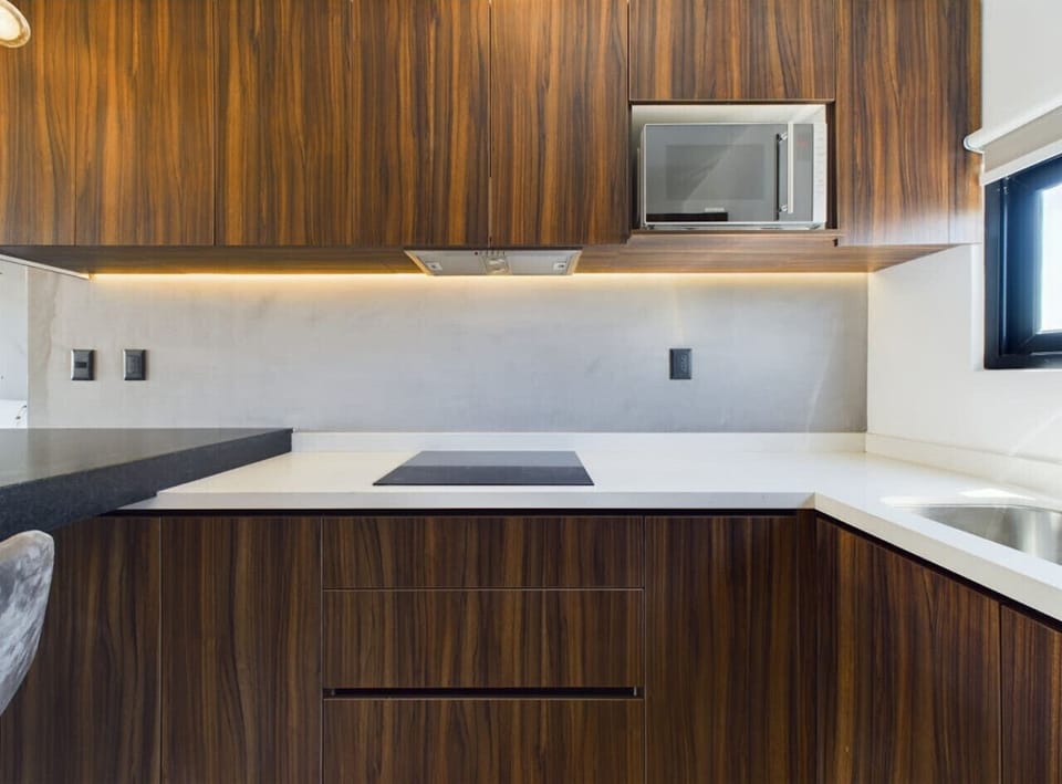 Sleek, modern kitchen with minimalist design—cook in style.