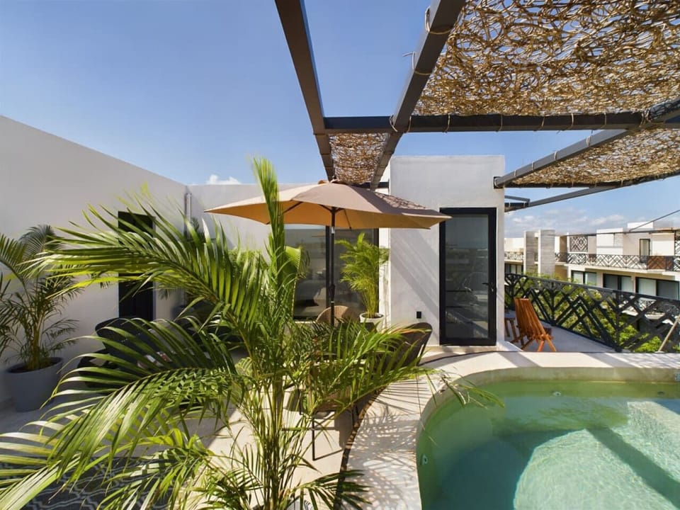 Soak up the sun in your private rooftop pool—pure luxury and chill.