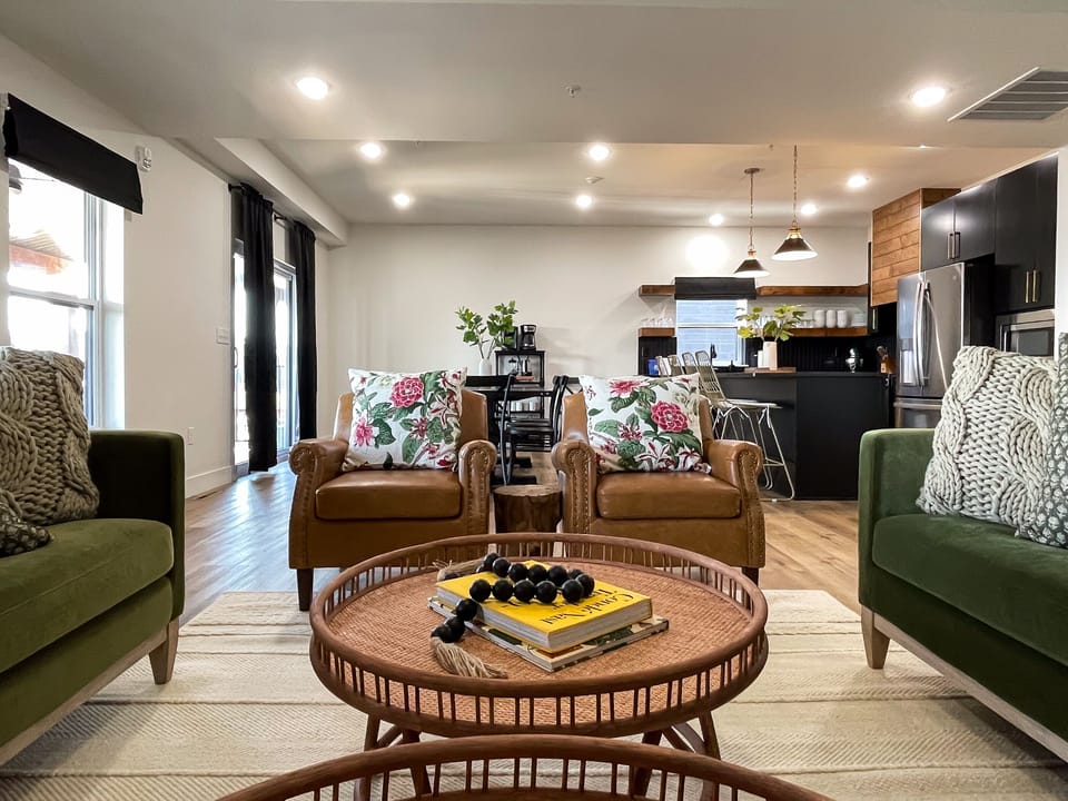 2 leather seats and open concept to dining room/kitchen