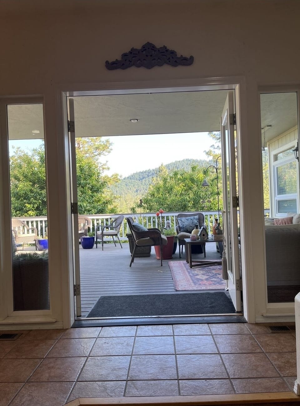 French doors open up to completely private Mountain View’s on 1500 Sq ft deck