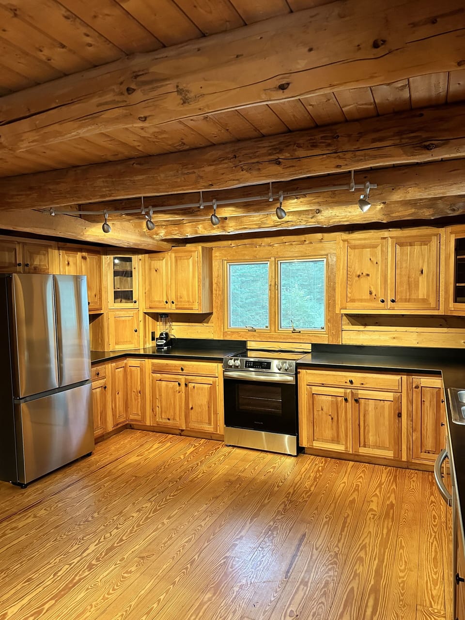 Newly equipped kitchen with shiny new appliances. 