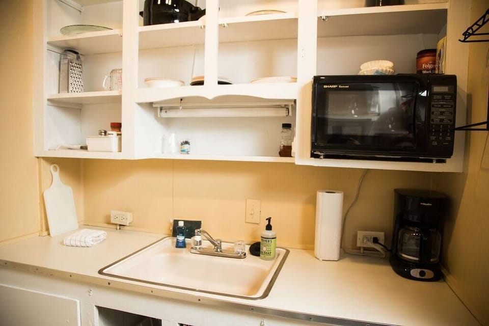We provide all of the coffee essentials you need including: coffee, creamer, and sugar.