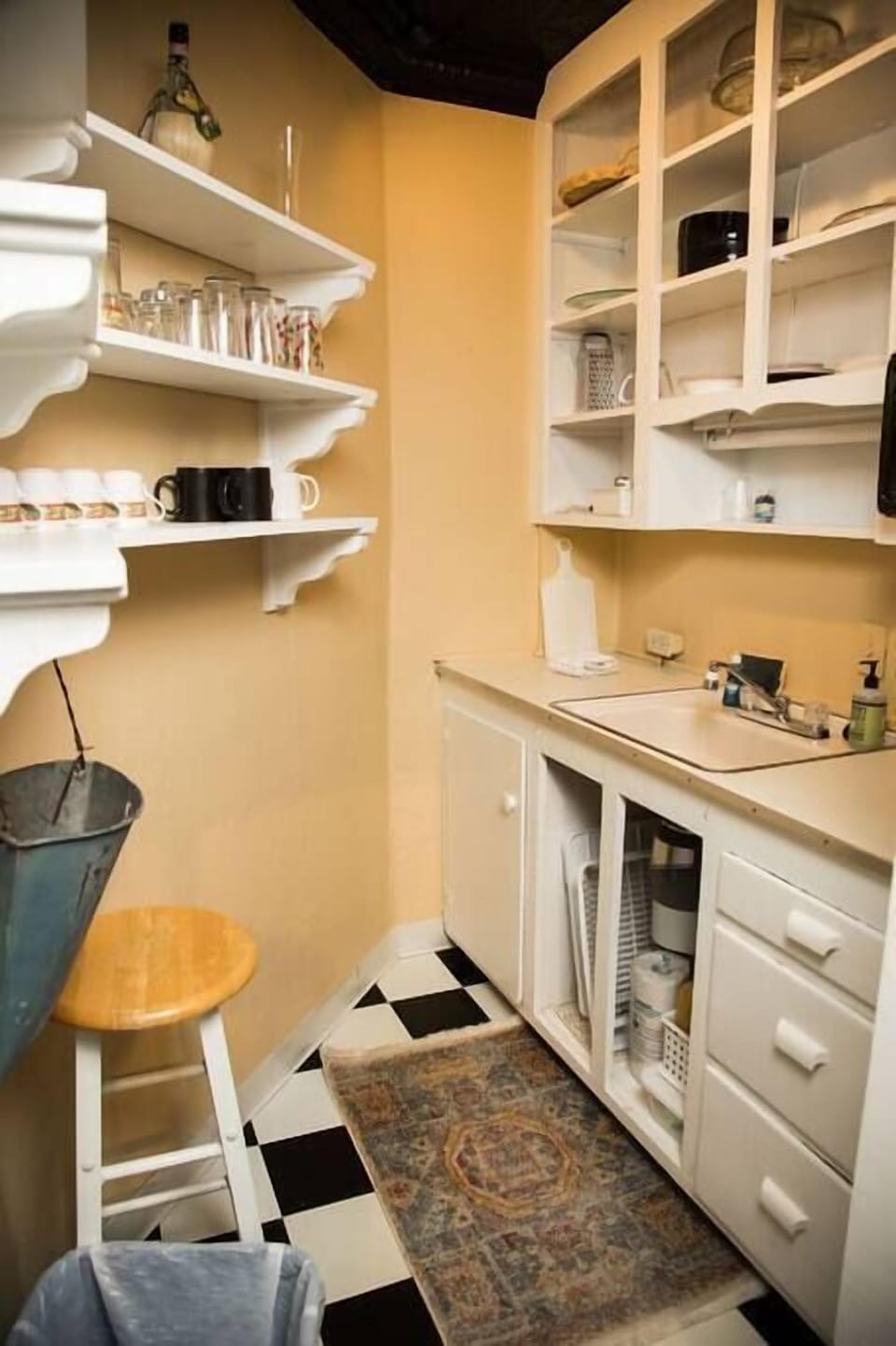 The pantry located off the kitchen has all of the essentials. 