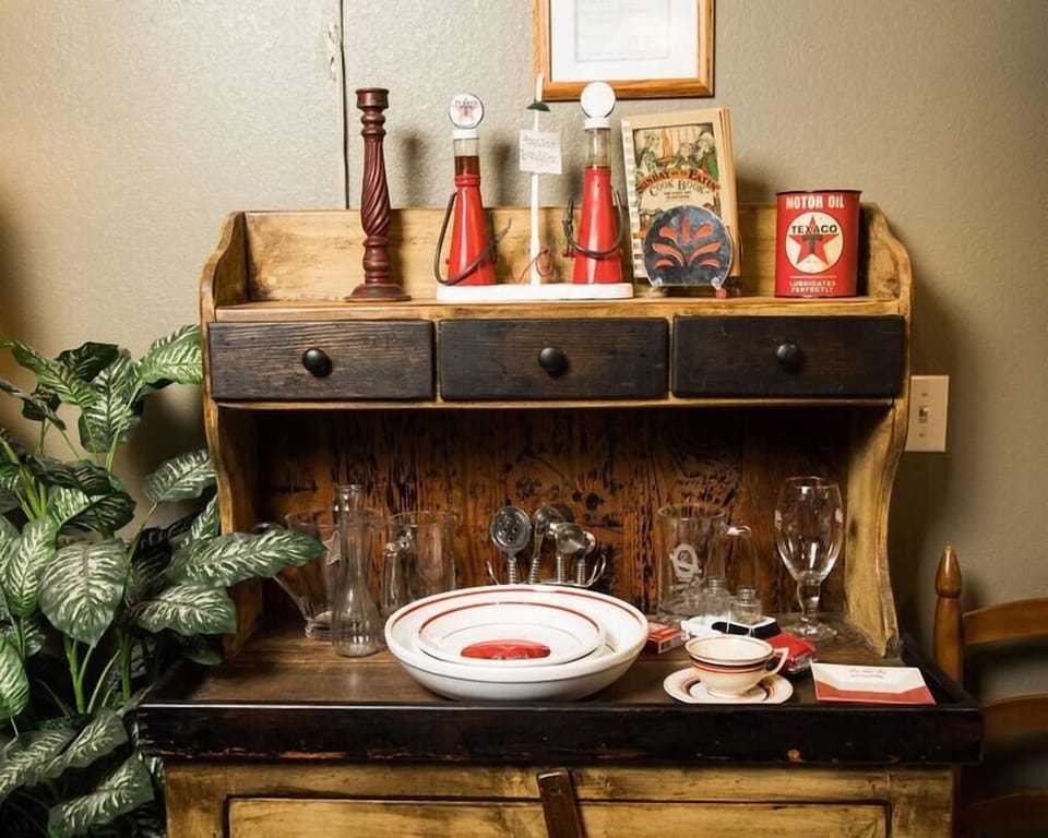 Unique Texaco relics flood this adorable cottage.