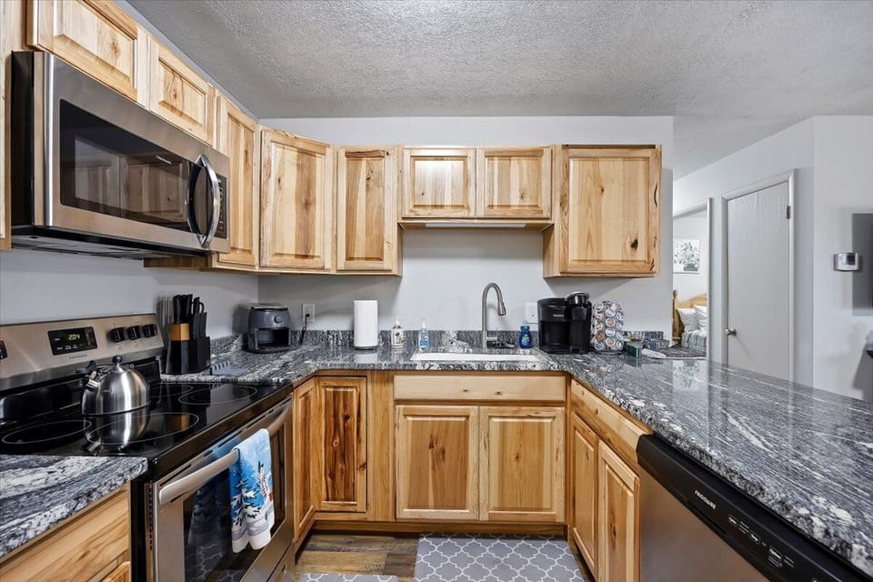 Kitchen with modern appliances for your convenience