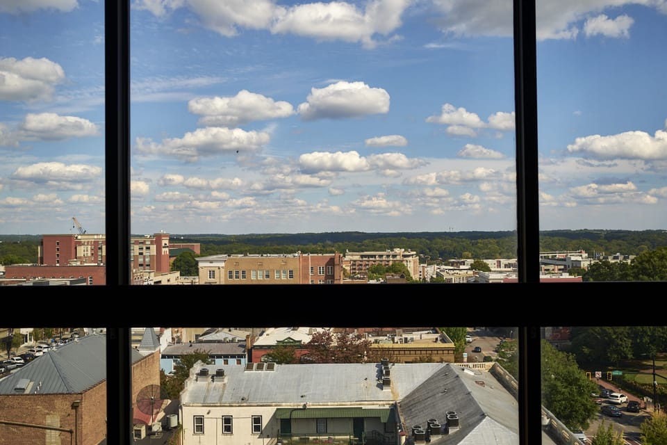 Enjoy a stunning view of downtown Athens as you exit elevator to 9th floor. 