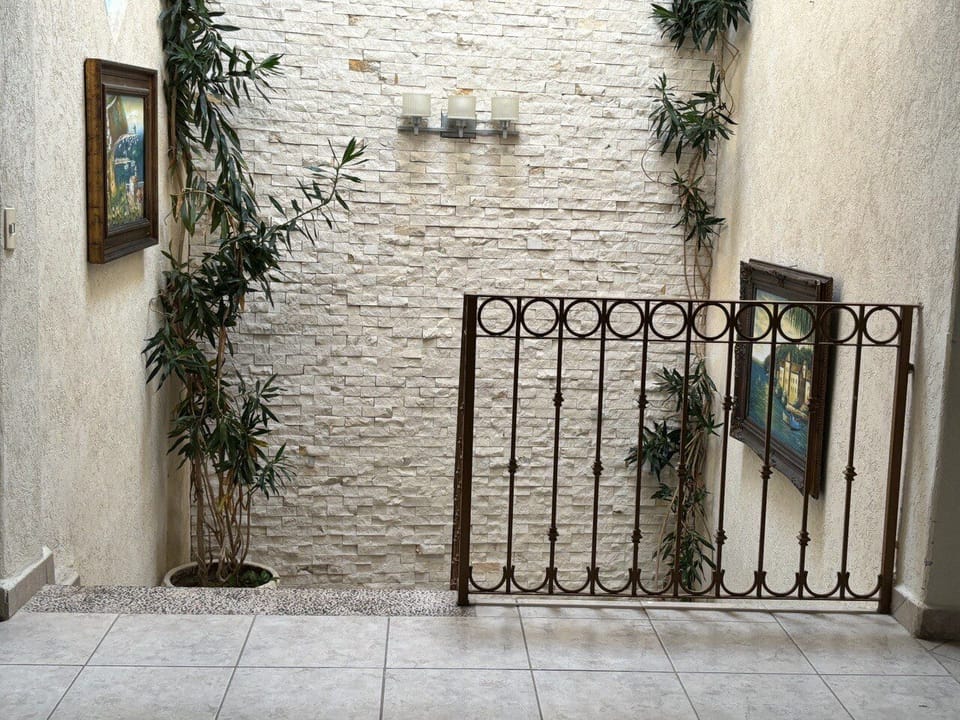 Stairway to living room fom the reception area