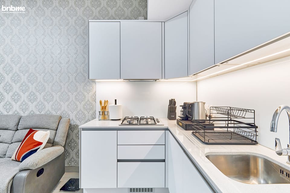 Apartment | Private kitchen | Electric kettle, dining tables