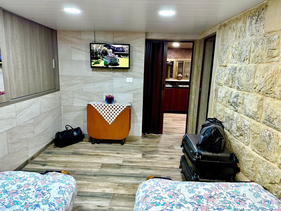 Premium Apartment, 1 Bedroom, Kitchen, Mountain View | 1 bedroom, premium bedding, desk, laptop workspace