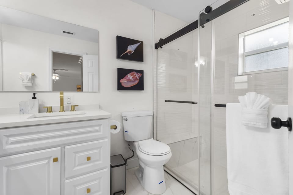 Master Bathroom 1 with double sinks and a shower.
