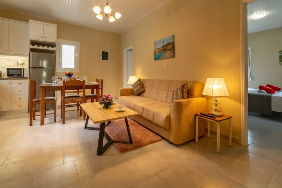 Open floor plan with living, dining and kitchen.