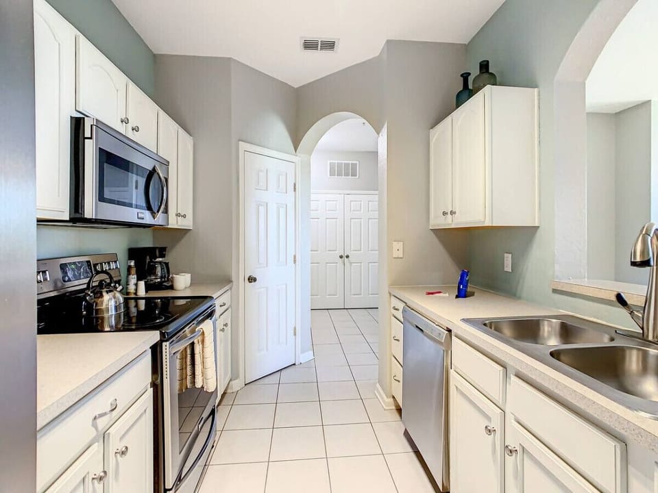Cook up something special in this fully equipped kitchen, designed for convenience and style.