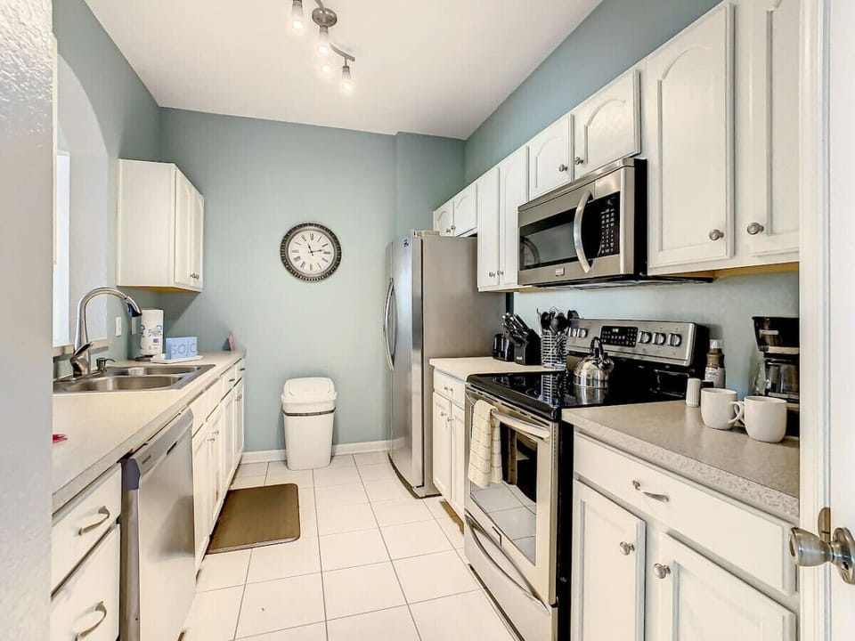Cook up something special in this fully equipped kitchen, designed for convenience and style.
