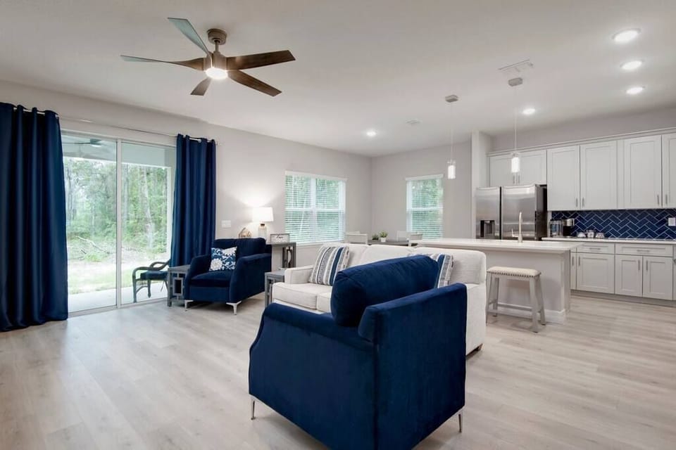 You’ll love the spaciousness of the open-concept floorplan. Sliders enable easy access to back patio