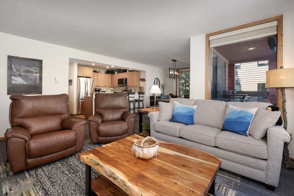 - Open living area connected to kitchen and dining   - Modern furnishings with rustic mountain touches   - Perfect setup for group gatherings and cozy nights