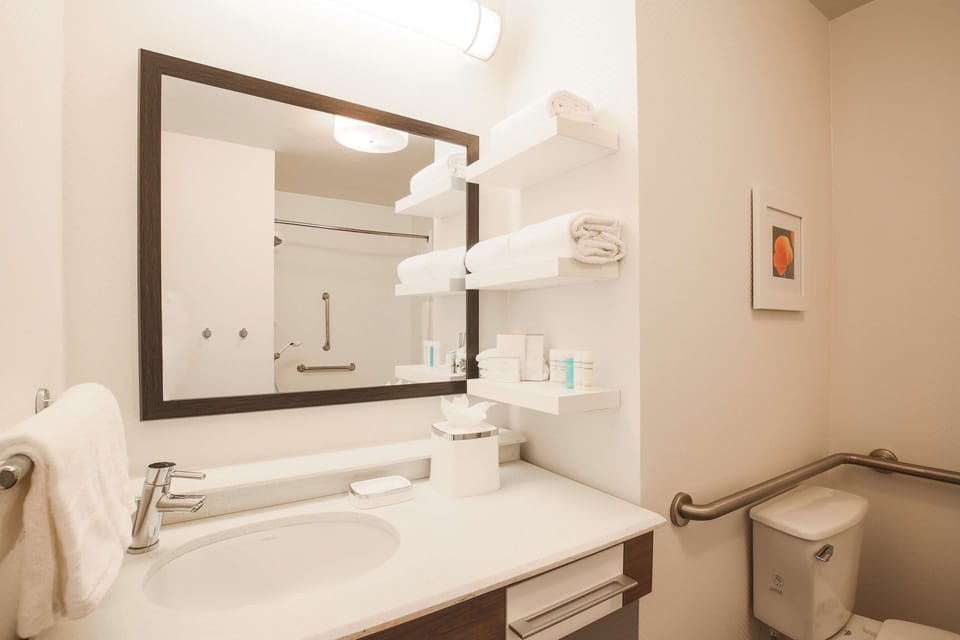 Eco-friendly toiletries, hair dryer, towels, soap