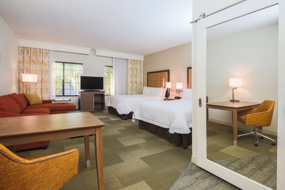 Hypo-allergenic bedding available, in-room safe, desk, laptop workspace