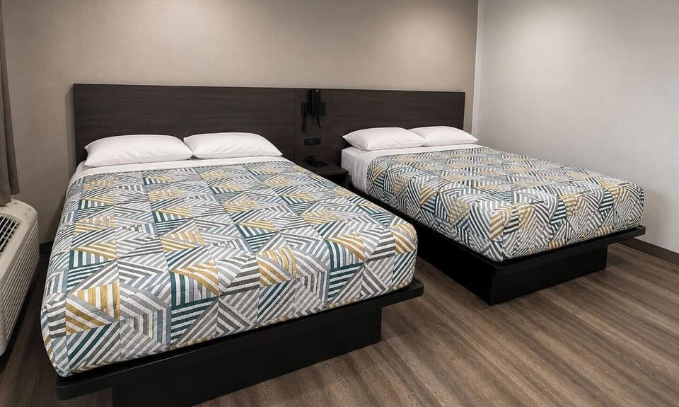 Deluxe Room, 2 Double Beds, Non Smoking, Refrigerator & Microwave | WiFi (free), bed sheets