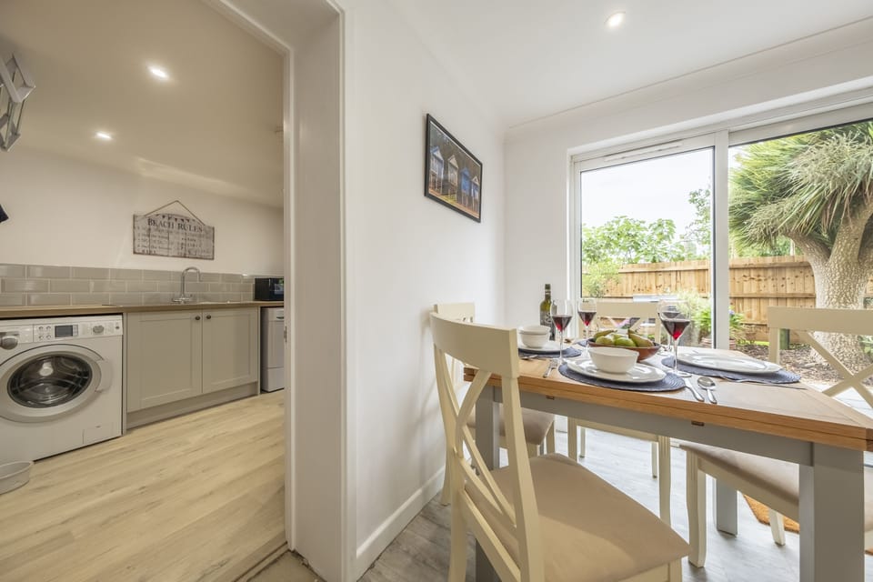 Ground floor: Access to utility room and shower room