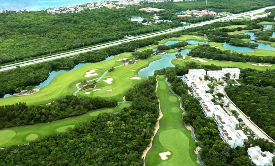 golfing excellence amidst stunning tropical landscapes, with an option to play for a small fee. 