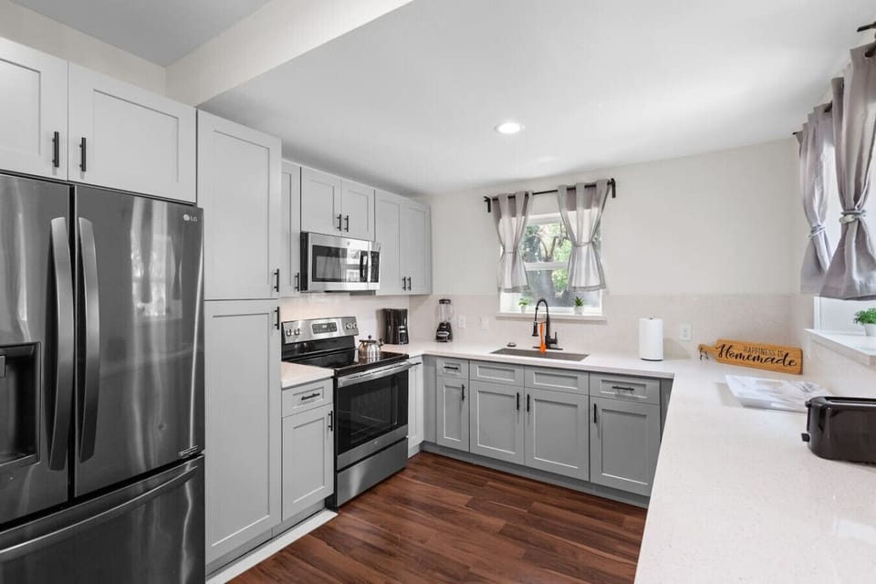 Bright, modern kitchen with stainless steel appliances, ample cabinetry, and clean finishes for easy everyday cooking.