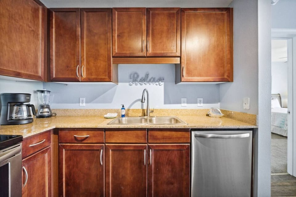 Fully Stocked Kitchen with Gulf Views and Island Bar Seating