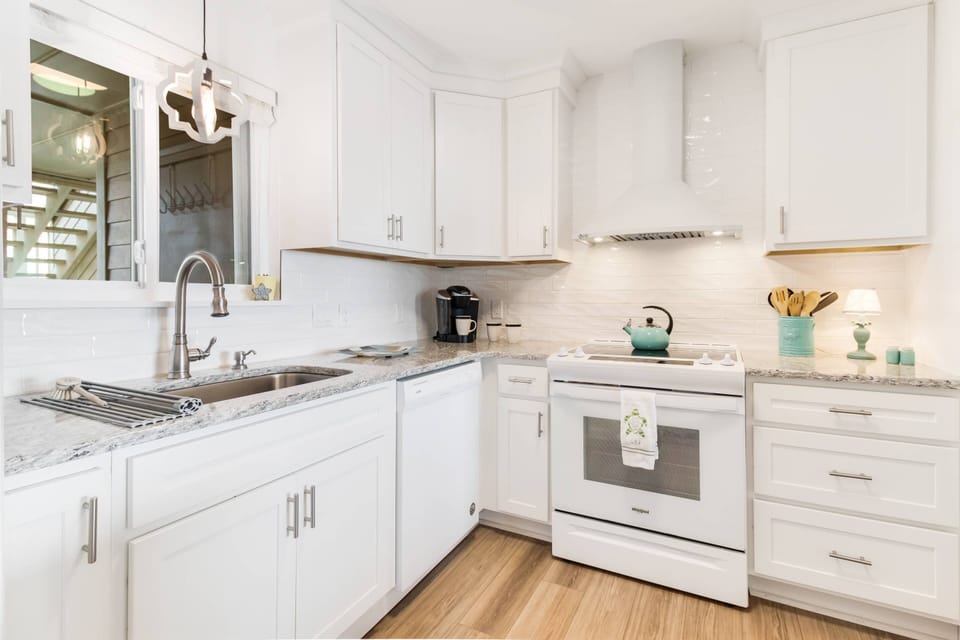 Kitchen with Appliances, Stove, and Spacious Countertops for Easy Meal Preparation.