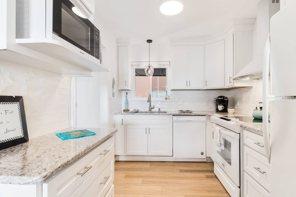 Come cook with joy! This kitchen has all you need for tasty meals and good times together.