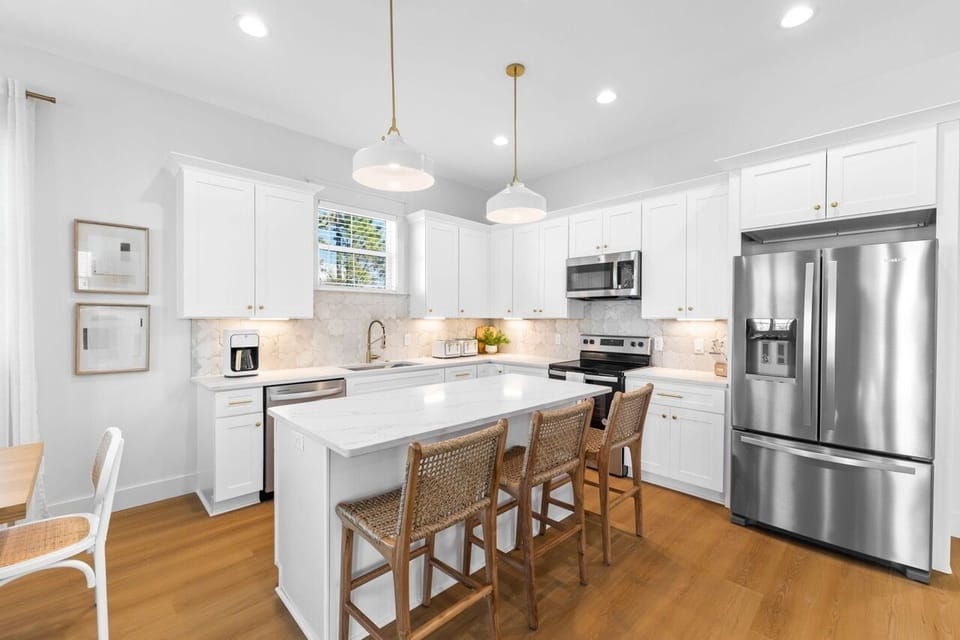 The high-end kitchen is perfect for preparing meals for your group.