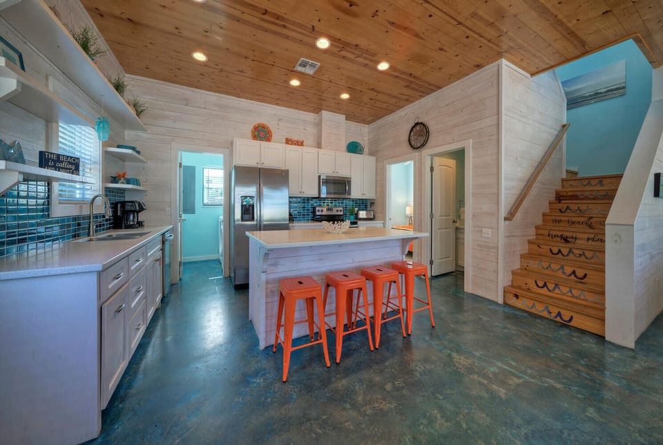Large center kitchen island with bar seating for 4