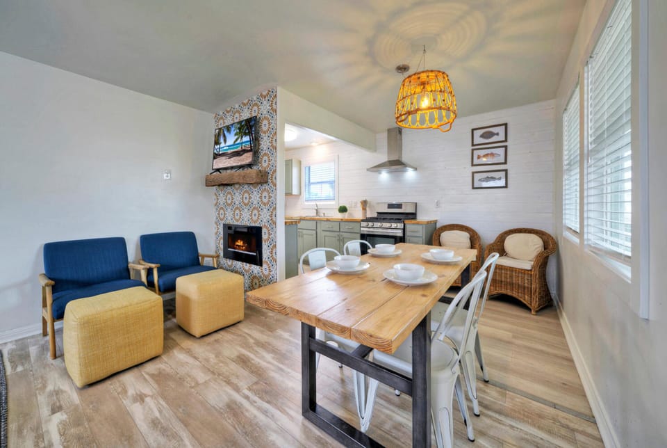 Dining by the warm embrace of the fireplace. 