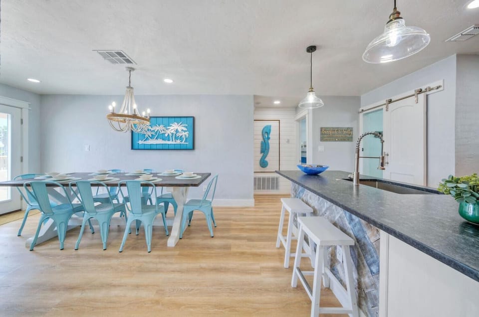 Additional barstool seating at the kitchen island.