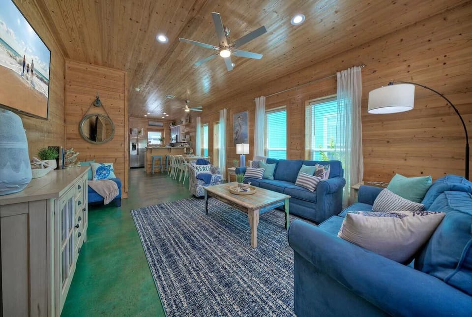 Elevate your living with wooden ceilings and spacious vibes.