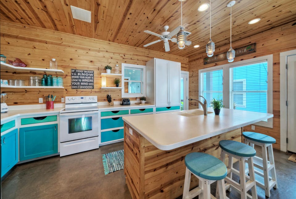 Barstool seating at the kitchen island.