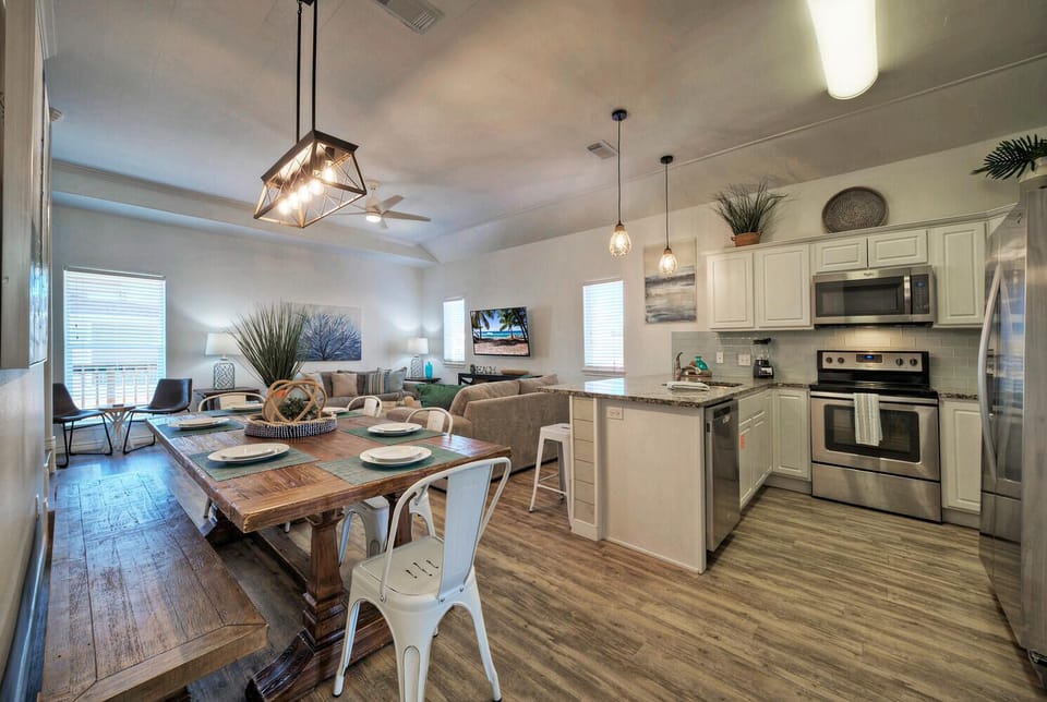 Seamless elegance: Modern kitchen and dining fusion.