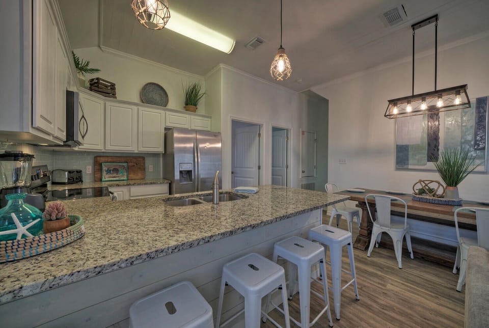 Showcasing the kitchen and island countertop.