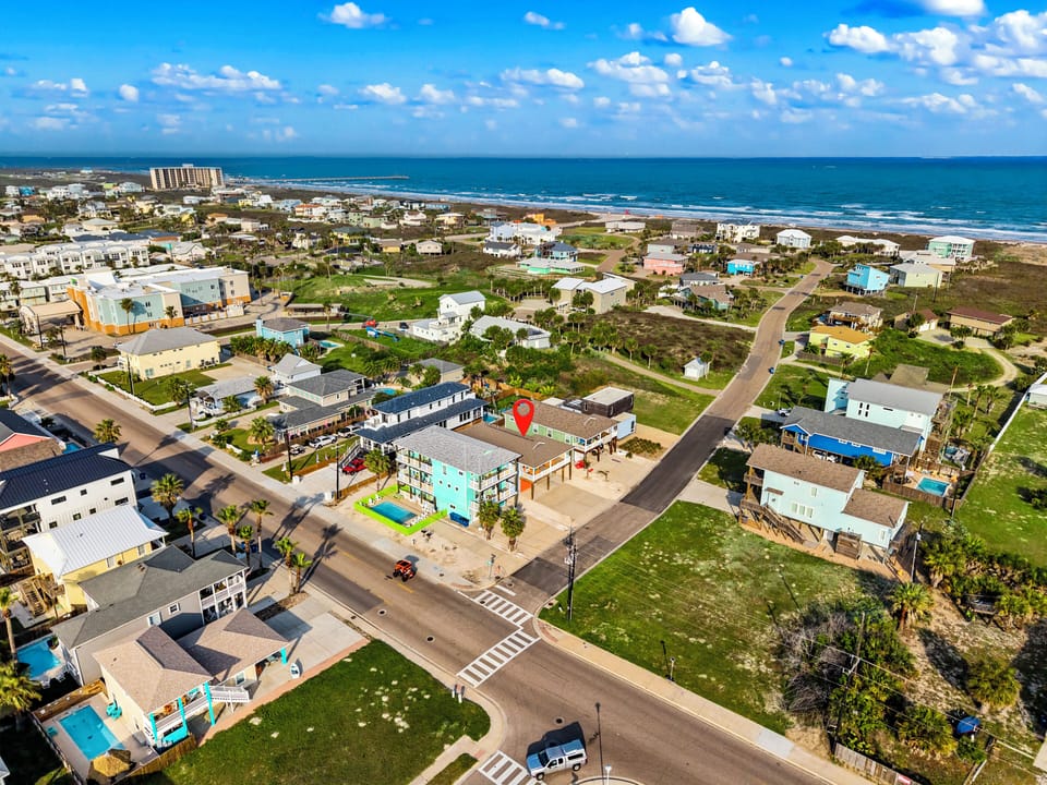 Aerial view showing proximity to the beach.